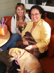 Sharon hanging out with Alice at Harborwalk during Mardi Gras Parade, note the fishbowl drink!