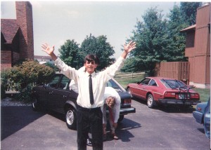 Gary, the driver, in the foreground, Scooter (the instigator) behind him with the \"pegged pants\", and the 280ZX in the background.