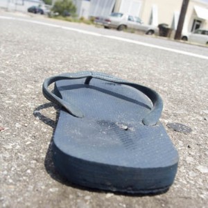 Shoe #302: A lone male flip flop found on Blount St., Pensacola, Florida