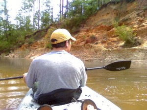 A view of Dave in the front of the Kayak on Juniper Creek just past the log jam section