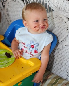 HAPPY 1st BIRTHDAY NORA! Nora not too sure about this chocolate thing yet. I am sure that will change.