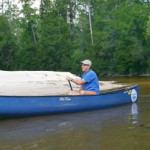 Jack Sanborn, Owner and Operator of Adventures Unlimited, canoeing down the Coldwater Creek