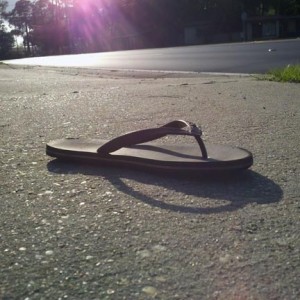 I am not sure if this was one of the girls flip flips or not, but it was on the sidewalk of the scene of the accident. I learned of its existence through a friend who sent me a link to the story on the Pensacola News Journal. The article on the website had a photo of the shoe accompanying it and I knew I had to go photograph it and dedicate it to  Shakuriyah Jenkins.