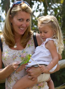 Nora reluctantly feeding a bird at Parakeet Point.